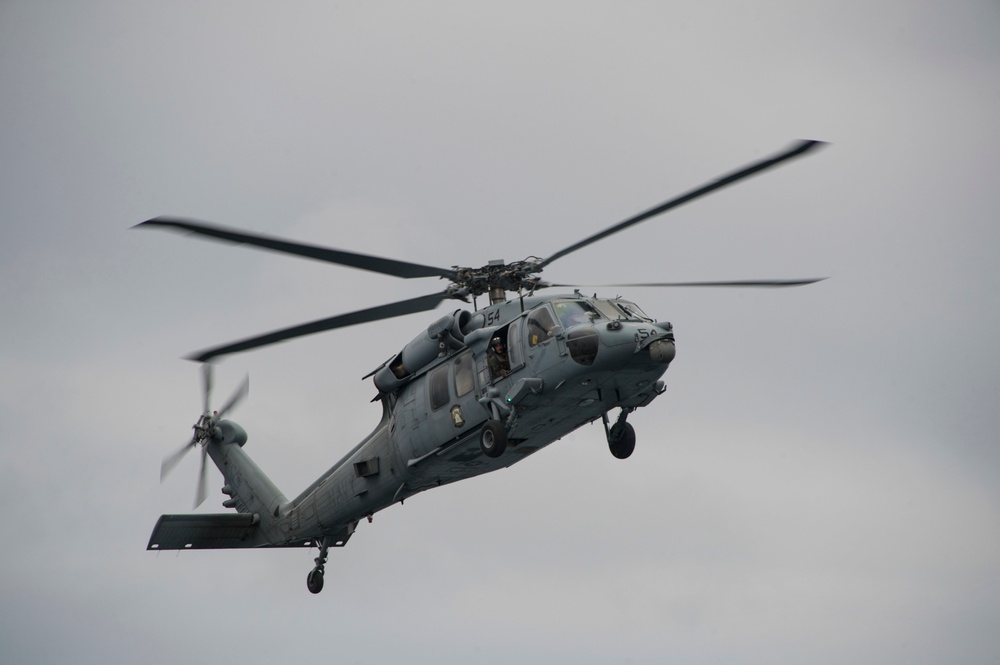 A MH-60 Seahawk prepares to land on flight deck
