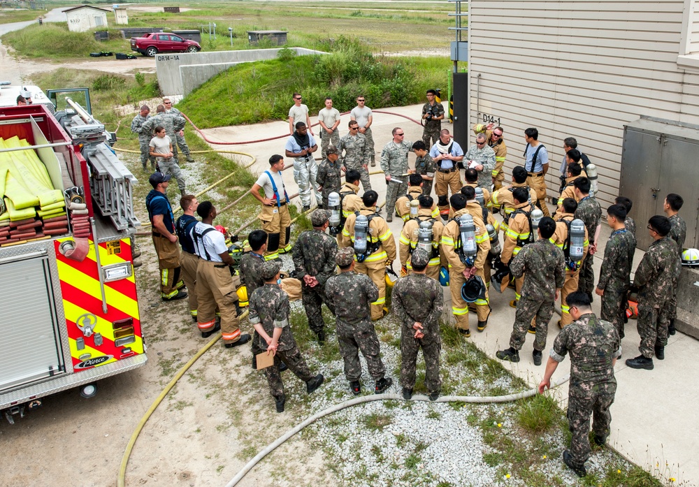 U.S., ROKAF firefighters battle the blaze during fire training