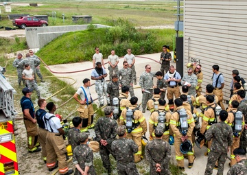 U.S., ROKAF firefighters battle the blaze during fire training