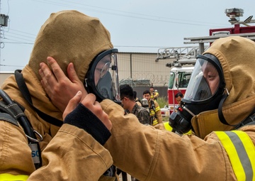 U.S., ROKAF firefighters battle the blaze during fire training