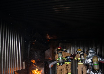 U.S., ROKAF firefighters battle the blaze during fire training