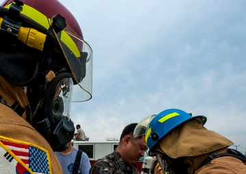 U.S., ROKAF firefighters battle the blaze during fire training