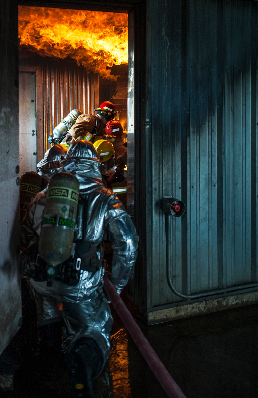 U.S., ROKAF firefighters battle the blaze during fire training