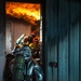 U.S., ROKAF firefighters battle the blaze during fire training