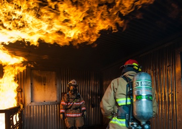 U.S., ROKAF firefighters battle the blaze during fire training