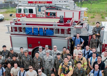 U.S., ROKAF firefighters battle the blaze during fire training
