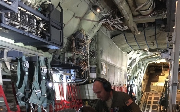 COMMANDER, NAVAL METEOROLOGY AND OCEANOGRAPHY COMMAND FLIES WITH HURRICANE HUNTERS