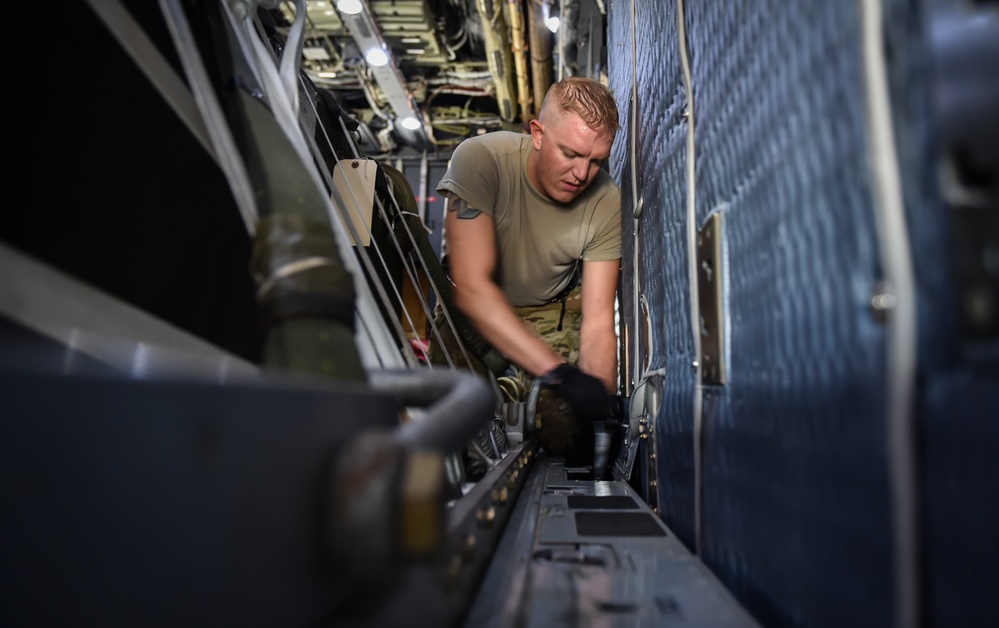 15th SOS loadmasters lock down cargo