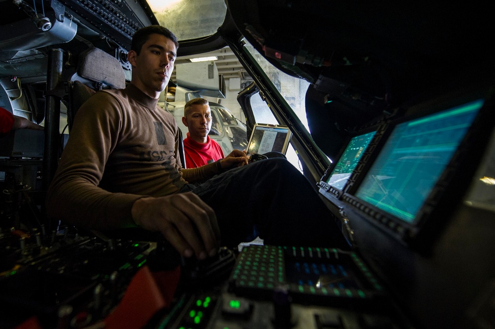 USS America Sailor troubleshoots