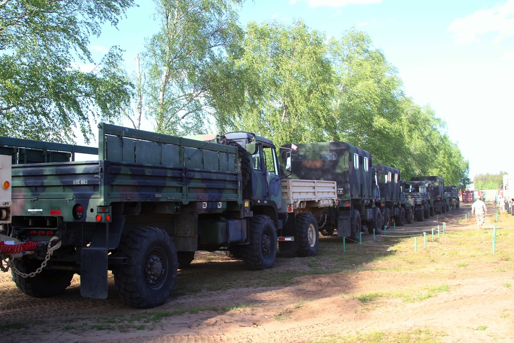 US Soldiers delivering equipment for Saber Strike Exercise