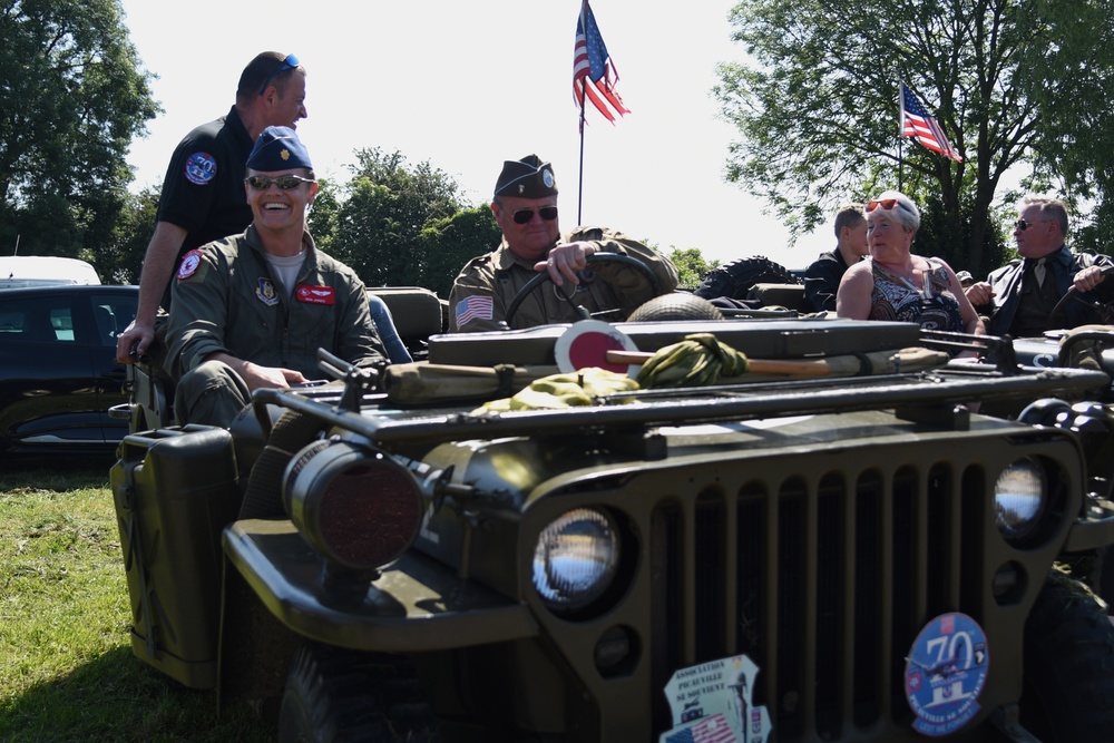 815th pilot mingles with reenactors during ceremonies for 73rd Anniversary of D-Day.