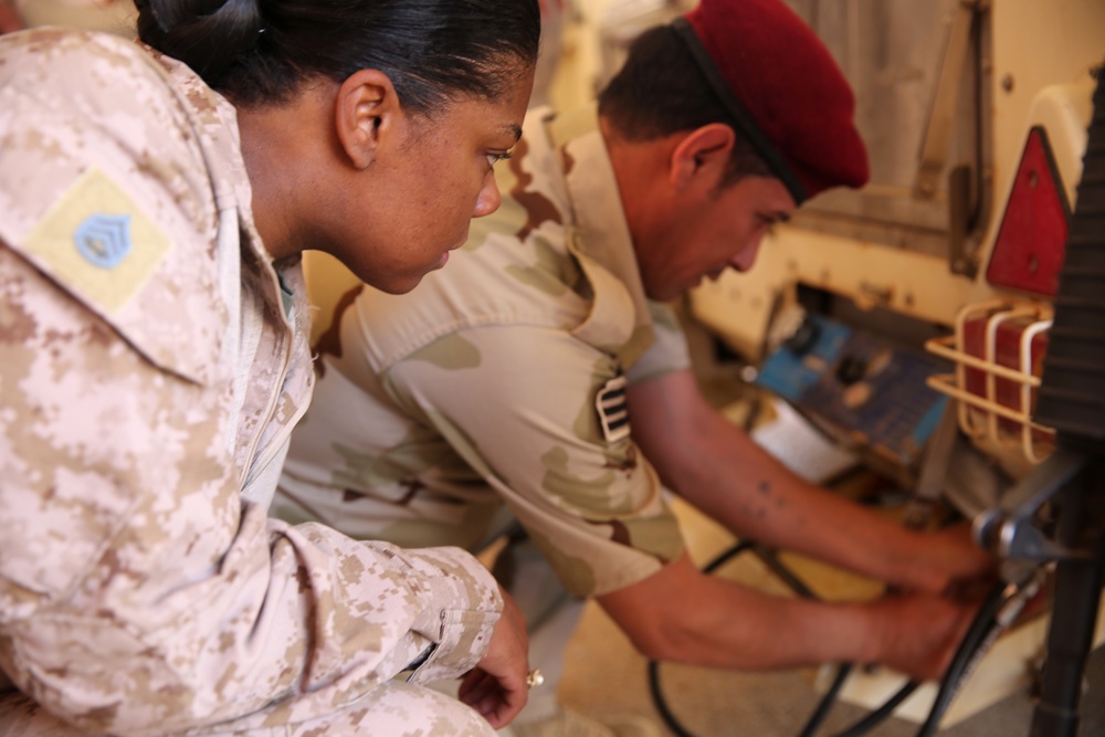 Baking, Breaking Bread:  SPMAGTF Food Service Marine teaches valuable skills to Iraqi Soldiers