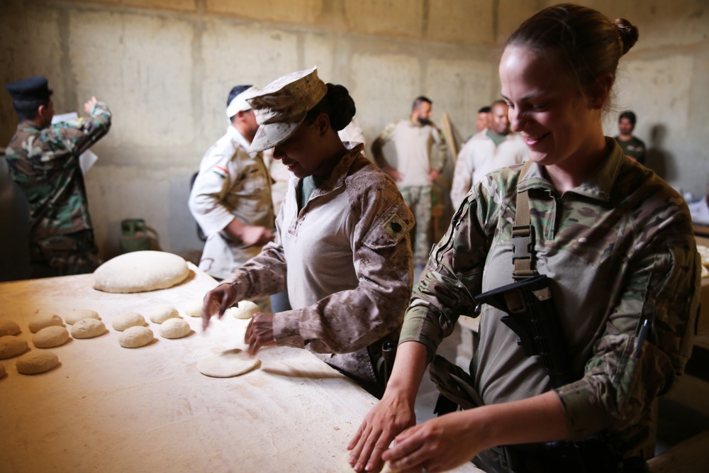 Baking, Breaking Bread:  SPMAGTF Food Service Marine teaches valuable skills to Iraqi Soldiers