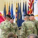 Lt. Col. Jeffrey Ignatowski, center, receives the Letterkenny Munitions Center colors from Col. James Hooper, left, during the Change of Command Ceremony, June 6. The outgoing commander is Lt. Col. Trenton Conner, right.