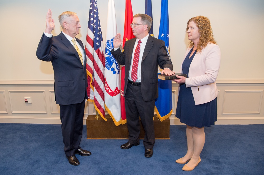 SD Mattis administers the Oath of Office to David L. Norquist