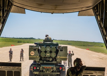 Missouri Air National Guard C-130 transports HIMARS