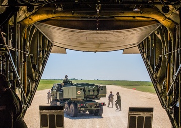 Missouri Air National Guard C-130 transports HIMARS