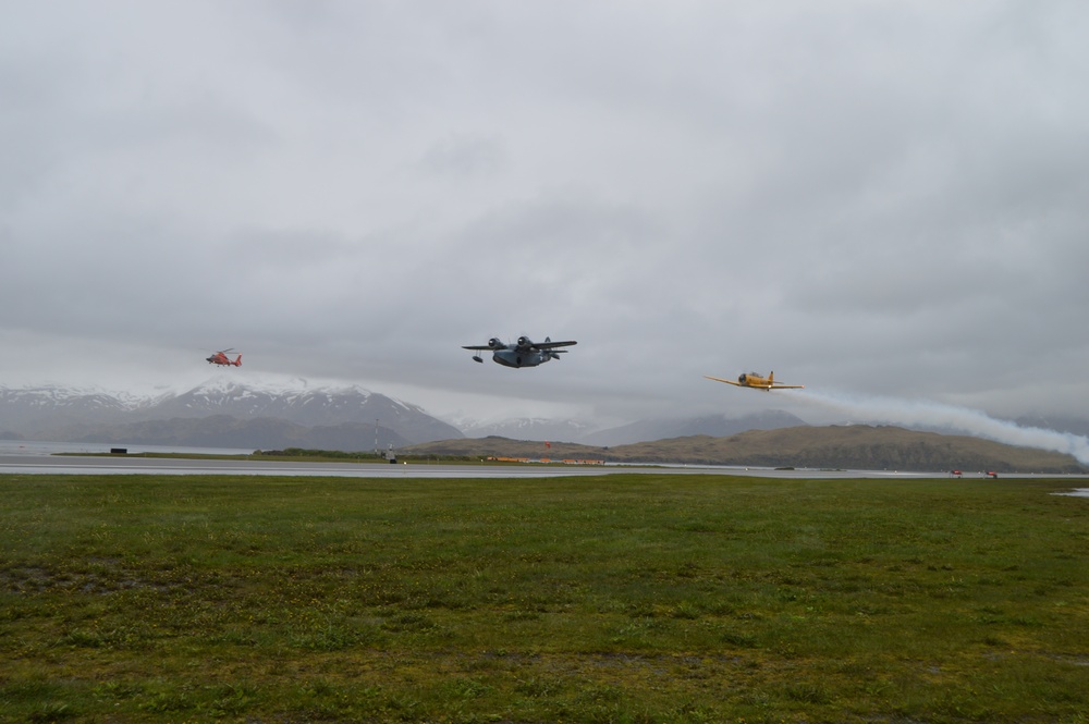 Coast Guard participates in flyover during ceremony for the 75th anniversary of the World War II Battle of Dutch Harbor, Alaska