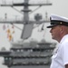 Sailor Renders Honors For Midway