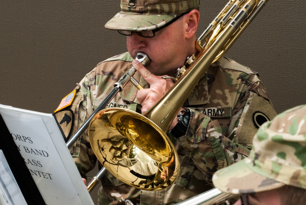 A Soldier with the 56th Army Band plays through a rendition of The Army Song