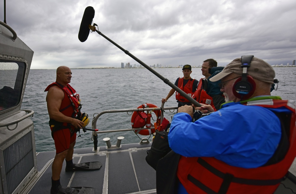 Jim Cantore speaks before getting in water for mock rescue with Coast Guard Air Station Miami