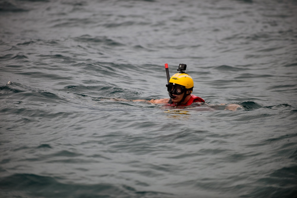 Jim Cantore treads water before mock rescue with Coast Guard Air Station Miami