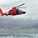 Coast Guard rescue swimmer signals okay after free fall deployment