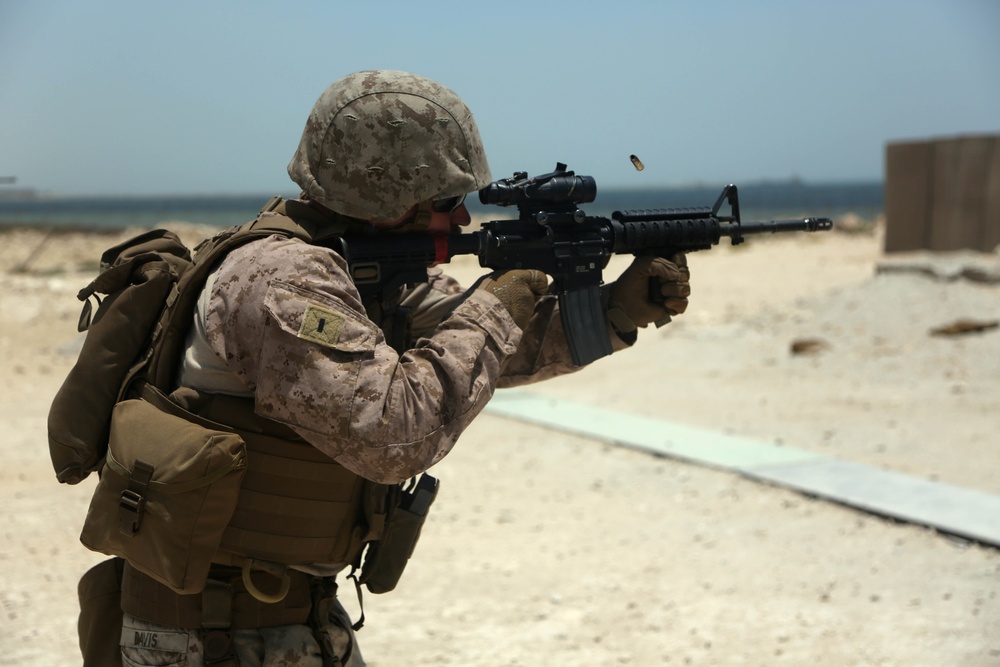 Smooth Transition: U.S. Marines with MWSS 372 conduct a live-fire weapons transition range