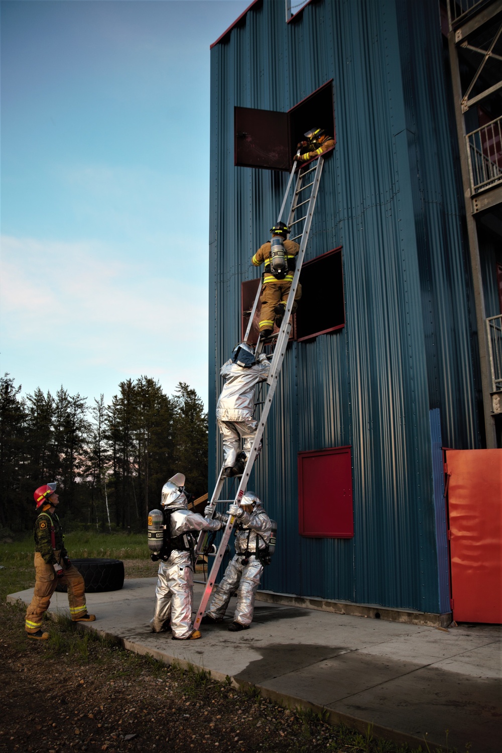 Royal Canadian Air Force firefighters train with MWSS-473 crash fire and rescue Marines