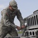 Mechanic Replaces Humvee Headlight