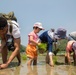 Station residents plant rice with Japanese locals