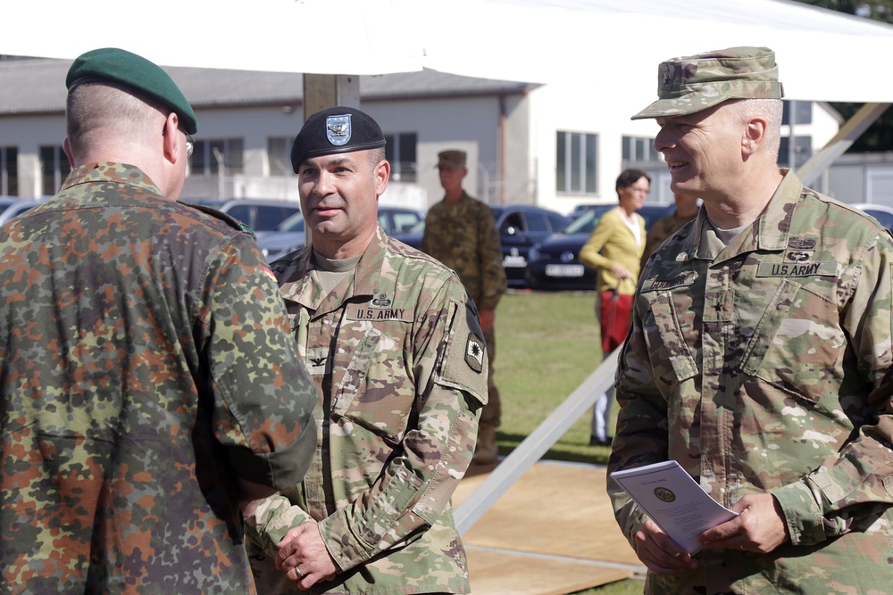 Seven years later, Heston returns to 361st Civil Affairs Brigade as new commander