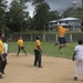 USS Lake Erie (CG 70) Sailors play volleyball with Sri Lankan kids