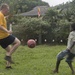 USS Lake Erie (CG 70) Sailors plays soccer with Sri Lankan children