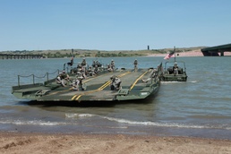 Participants of Golden Coyote experience river crossing