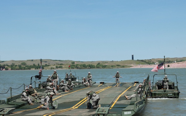 Participants of Golden Coyote experience river crossing
