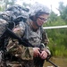 Warrior Crosses Water During Ruck March