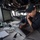170612-N-VG727-041 A female U.S. Navy sailor is working at a workstation aboard what appears to be the bridge or combat information center of USS Barry (DDG-52), a Navy destroyer. She is wearing a dark Navy uniform and a ship's ball cap with 'BARRY 52' visible, and is focused on a laptop computer. The workspace contains multiple monitors, navigation documents, and various shipboard equipment.