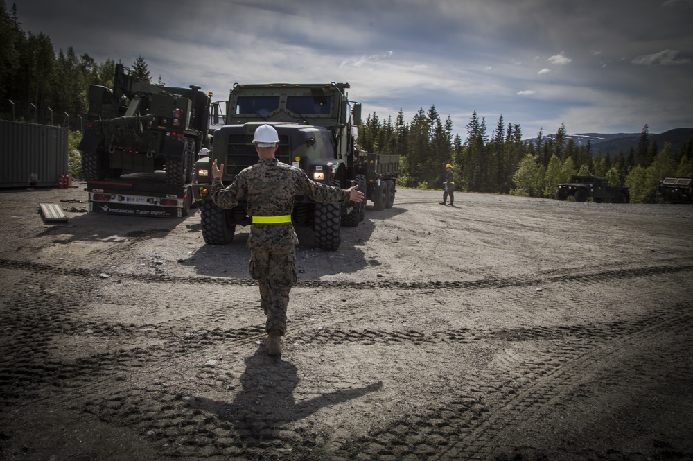 Optimizing Readiness in Norway: MRF-E Marines rotate cave equipment on USNS Lopez