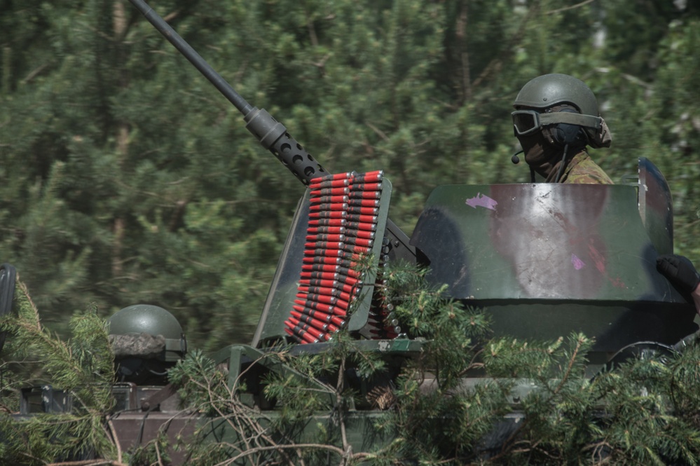 Lithuanian soldiers maneuver