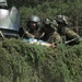 Lithuanian soldiers maneuver