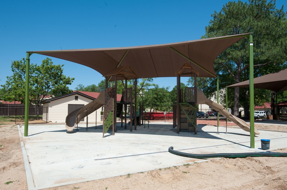 Ongoing construction on playground near Bldg #1 &amp; Base Swimming Pool