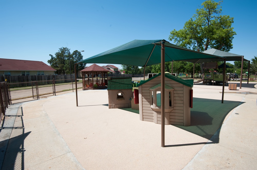 Ongoing construction on outdoor play area for the Child Development Center, Bldg 22.