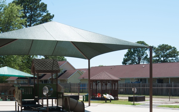 Ongoing construction on outdoor play area for the Child Development Center, Bldg 22.