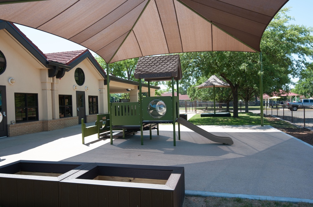 Ongoing construction on outdoor play area for the Child Development Center, Bldg 22.