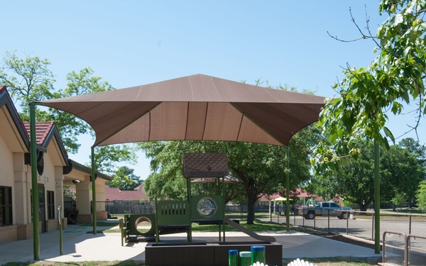 Ongoing construction on outdoor play area for the Child Development Center, Bldg 22.