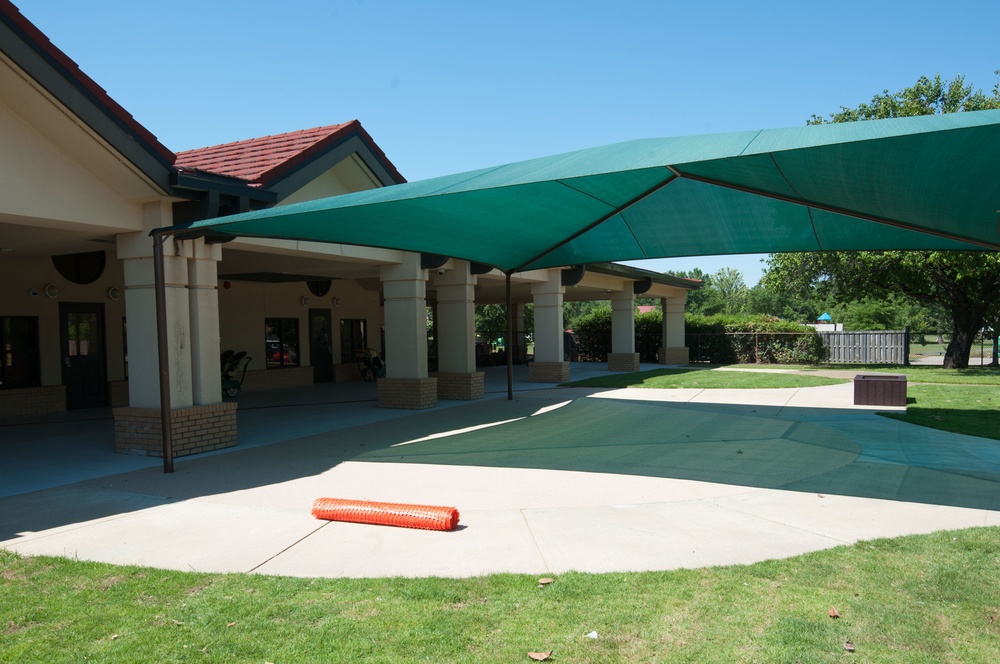 Ongoing construction on outdoor play area for the Child Development Center, Bldg 22.