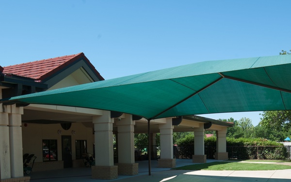 Ongoing construction on outdoor play area for the Child Development Center, Bldg 22.