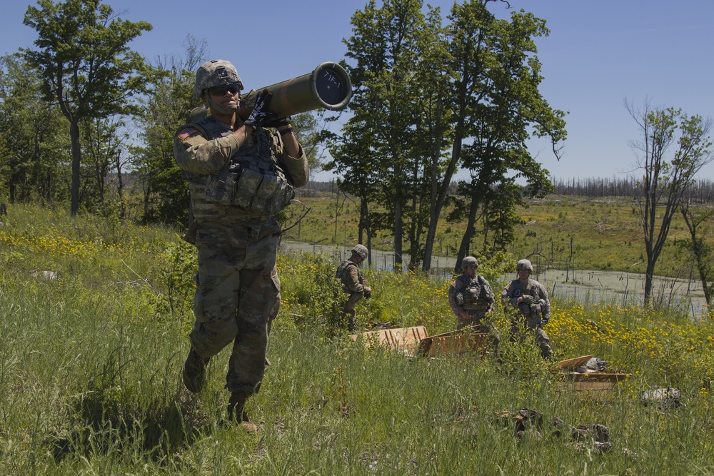 Soldier Carries TOW Missile