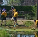 Sailors work with the Sasebo community to clean a zoo
